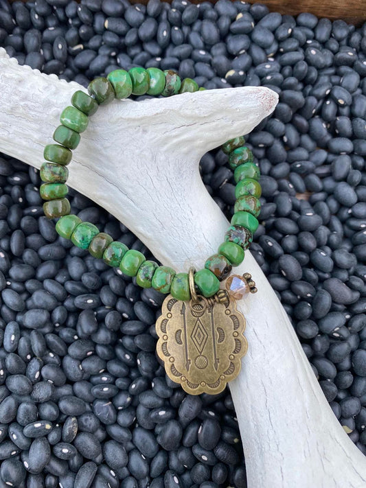 Green stretch Bracelet with stamped charm